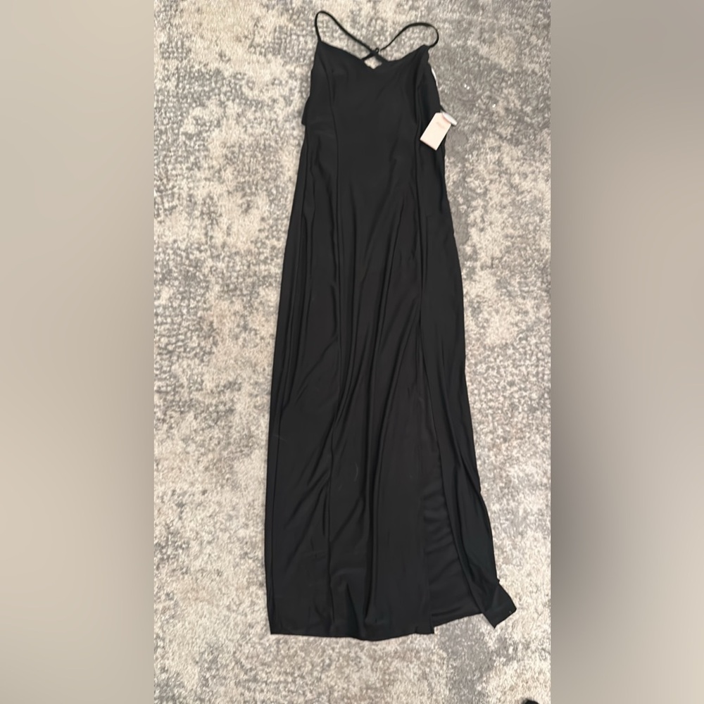 Black form fitting maxi with front slit and backless